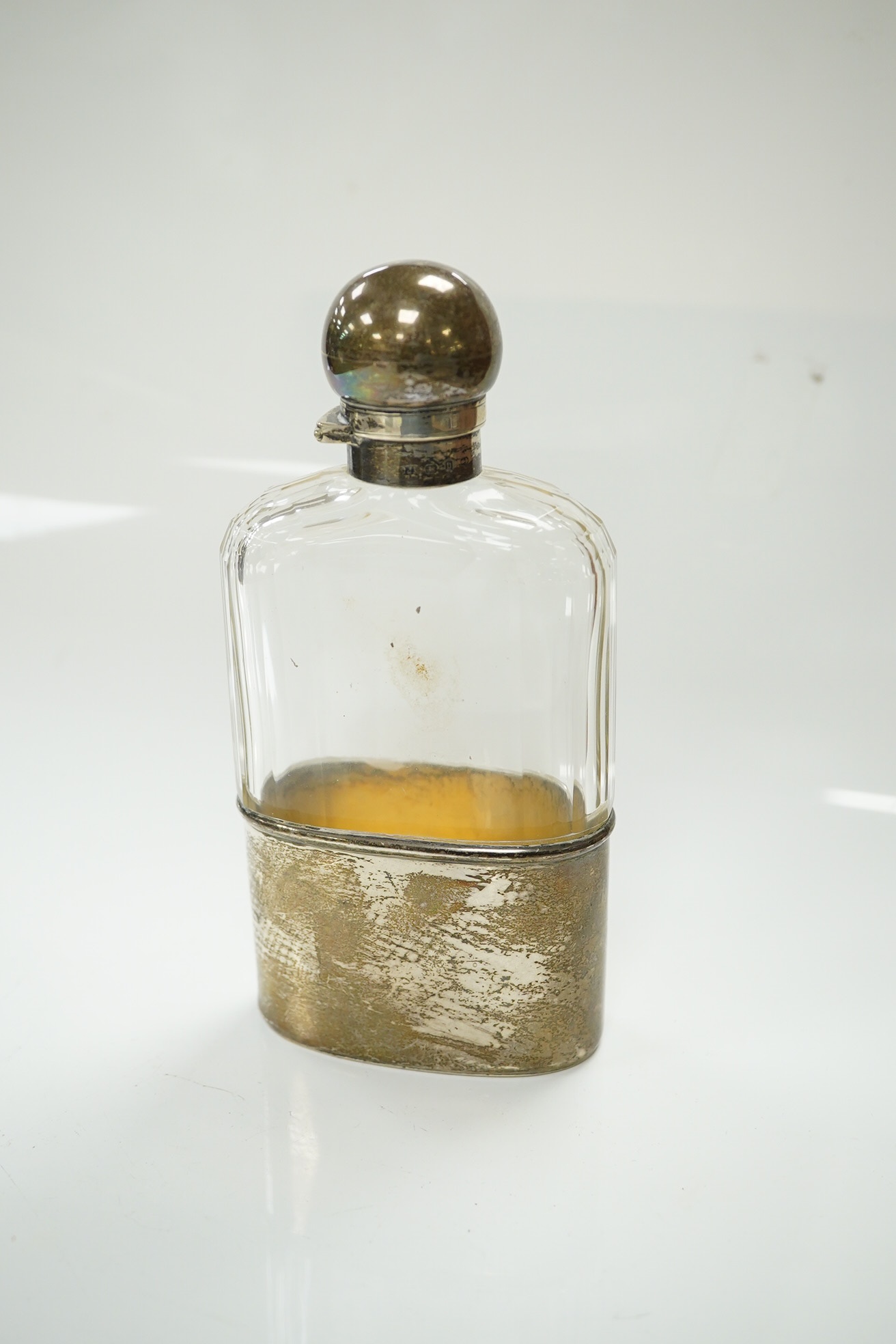 A late Victorian silver mounted cut glass pocket flask, 15cm. Condition - good